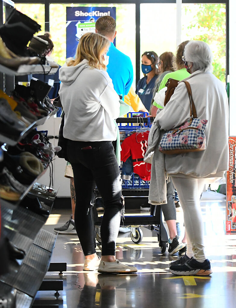 Customers line up to checkout